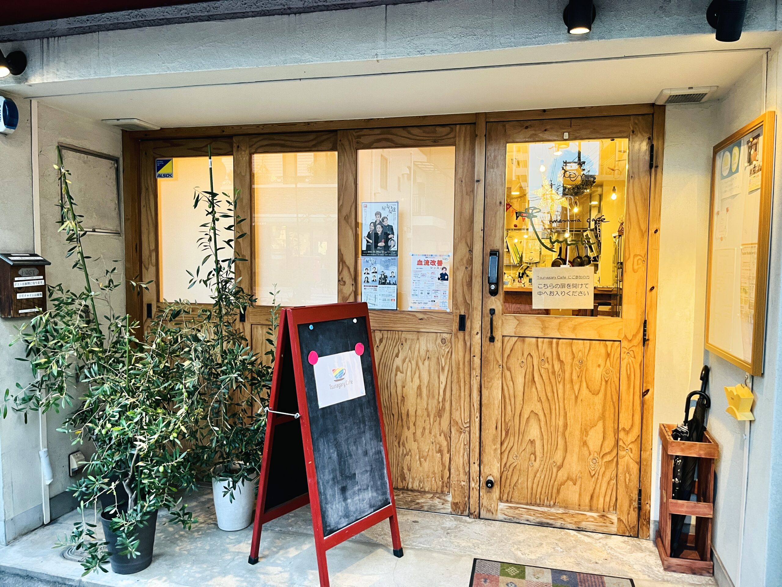 Tsunagary Cafeの案内を掲示した会場入口